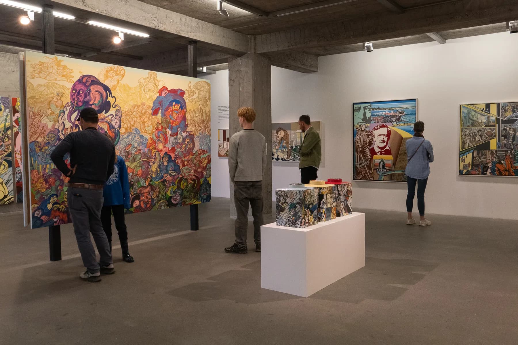 Visitors viewing contemporary artwork in a Reykjavik gallery.